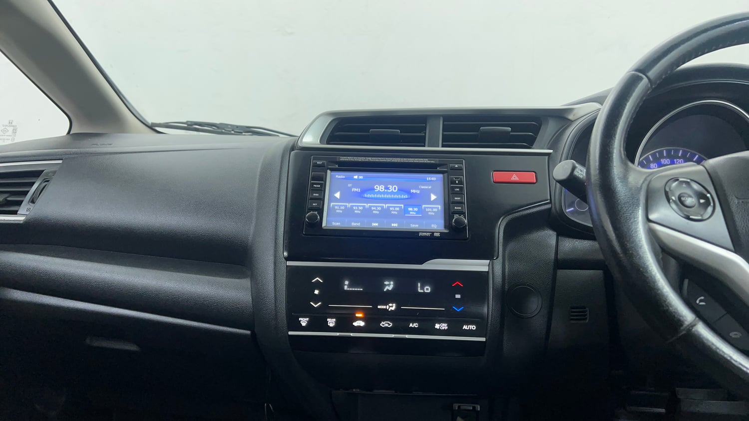 Used 2016 Honda Jazz VX Petrol+cng(outside fitted) Cng Manual interior MUSIC SYSTEM & AC CONTROL VIEW