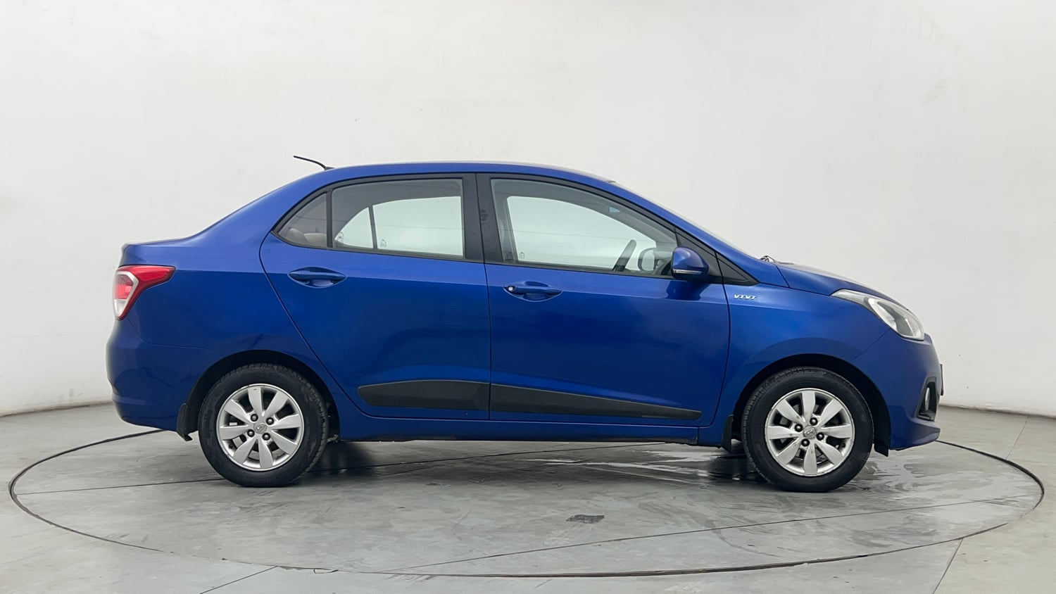 Used 2015 Hyundai Xcent S 1.2 (O) Petrol Manual exterior RIGHT SIDE VIEW