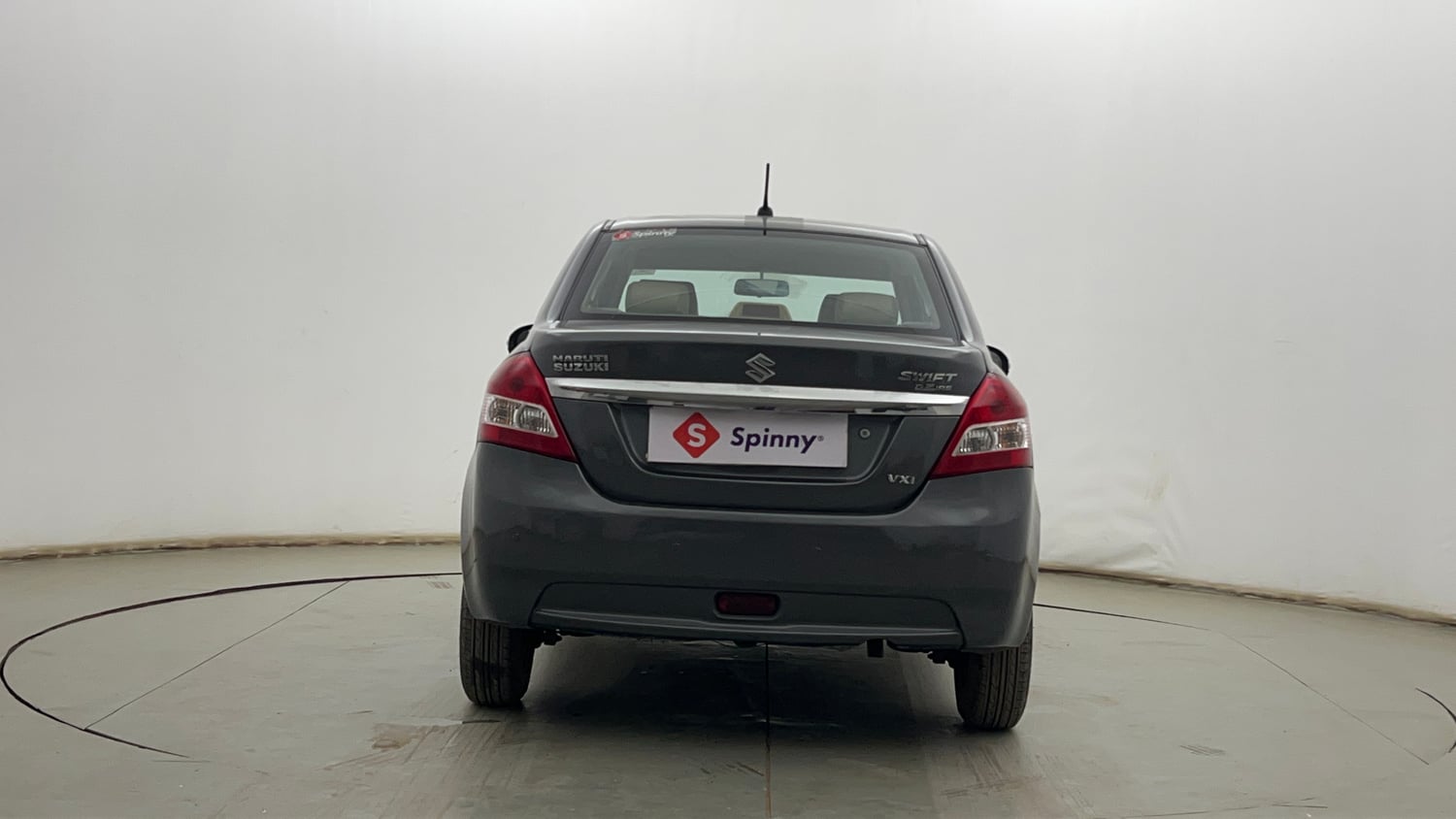 Used 2014 Maruti Suzuki Swift Dzire VXI Petrol Manual exterior BACK VIEW