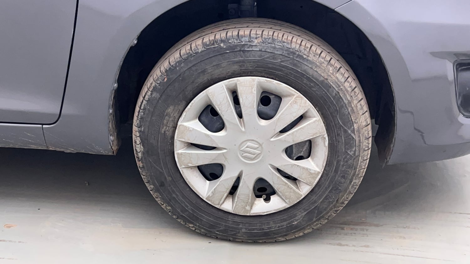 Used 2014 Maruti Suzuki Swift Dzire VXI Petrol Manual tyres RIGHT FRONT TYRE RIM VIEW