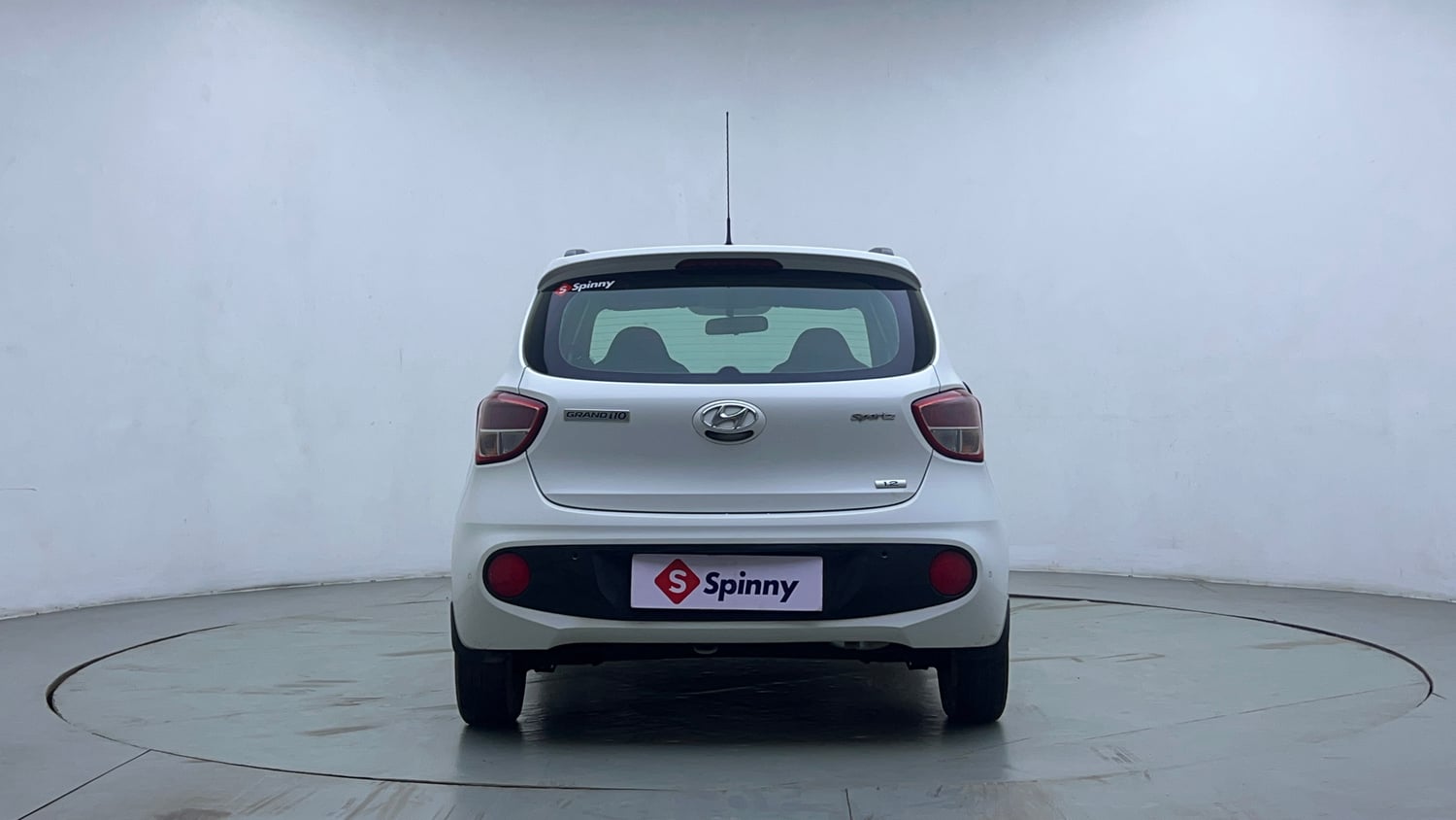 Used 2019 Hyundai Grand i10 Sportz AT 1.2 Kappa VTVT Petrol Automatic exterior BACK VIEW