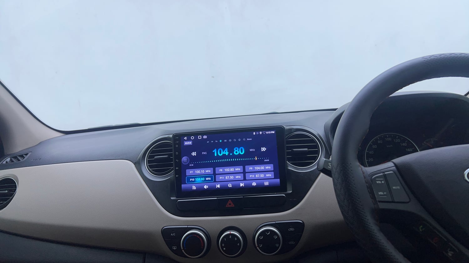 Used 2019 Hyundai Grand i10 Sportz AT 1.2 Kappa VTVT Petrol Automatic interior MUSIC SYSTEM & AC CONTROL VIEW