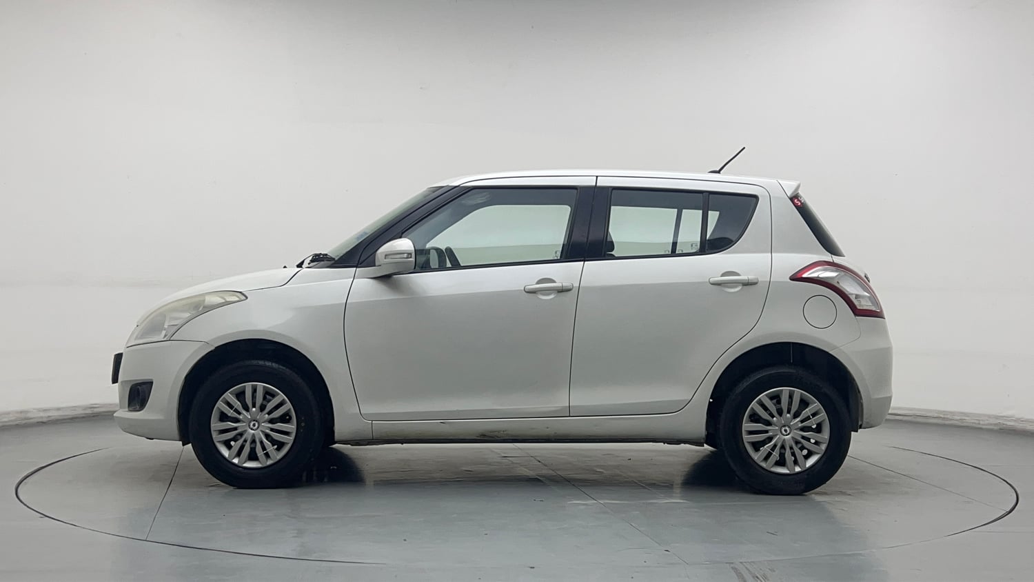 Used 2014 Maruti Suzuki Swift VXi Petrol Manual exterior LEFT SIDE VIEW