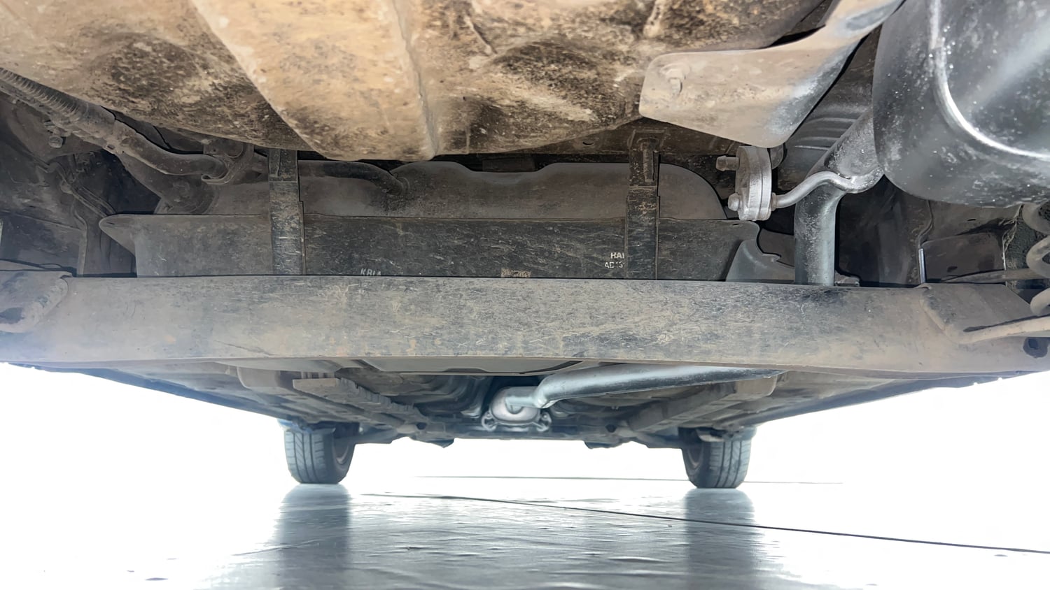 Used 2015 Hyundai Xcent S 1.2 (O) Petrol Manual extra REAR UNDERBODY VIEW (TAKEN FROM REAR)