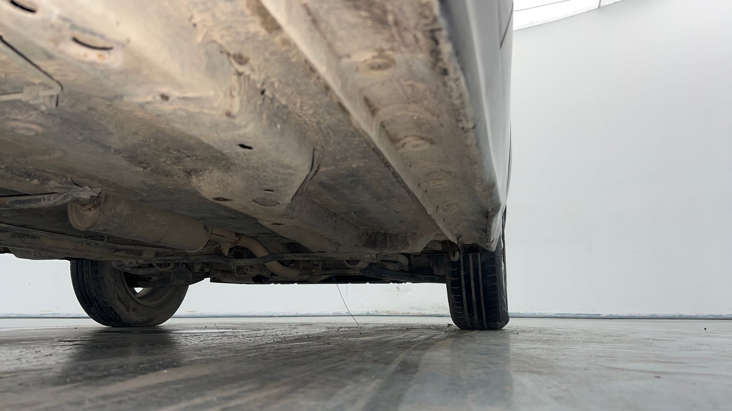 Used 2018 Tata Tigor Revotorq XZ (O) Diesel Manual extra REAR RIGHT UNDERBODY VIEW
