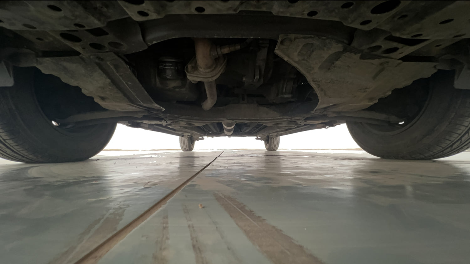 Used 2014 Maruti Suzuki Swift Dzire VXI Petrol Manual extra FRONT LEFT UNDERBODY VIEW