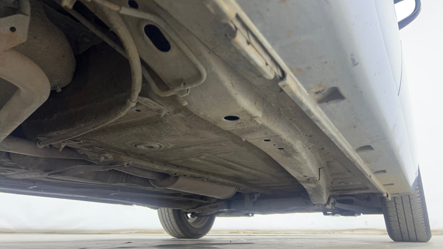 Used 2015 Maruti Suzuki Baleno Alpha 1.2 Petrol Manual extra REAR RIGHT UNDERBODY VIEW