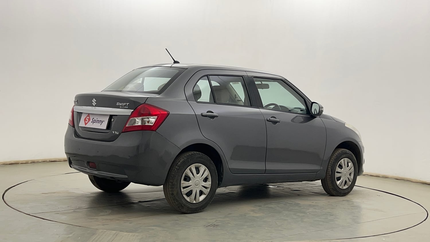 Used 2014 Maruti Suzuki Swift Dzire VXI Petrol Manual exterior RIGHT REAR CORNER VIEW