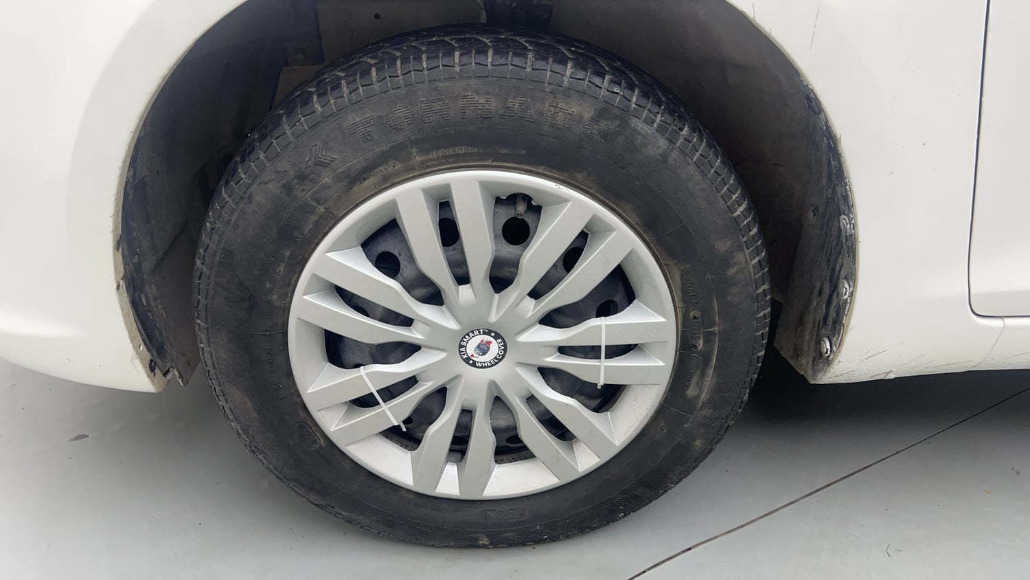Used 2015 Maruti Suzuki Swift Dzire VXI Petrol Manual tyres LEFT FRONT TYRE RIM VIEW