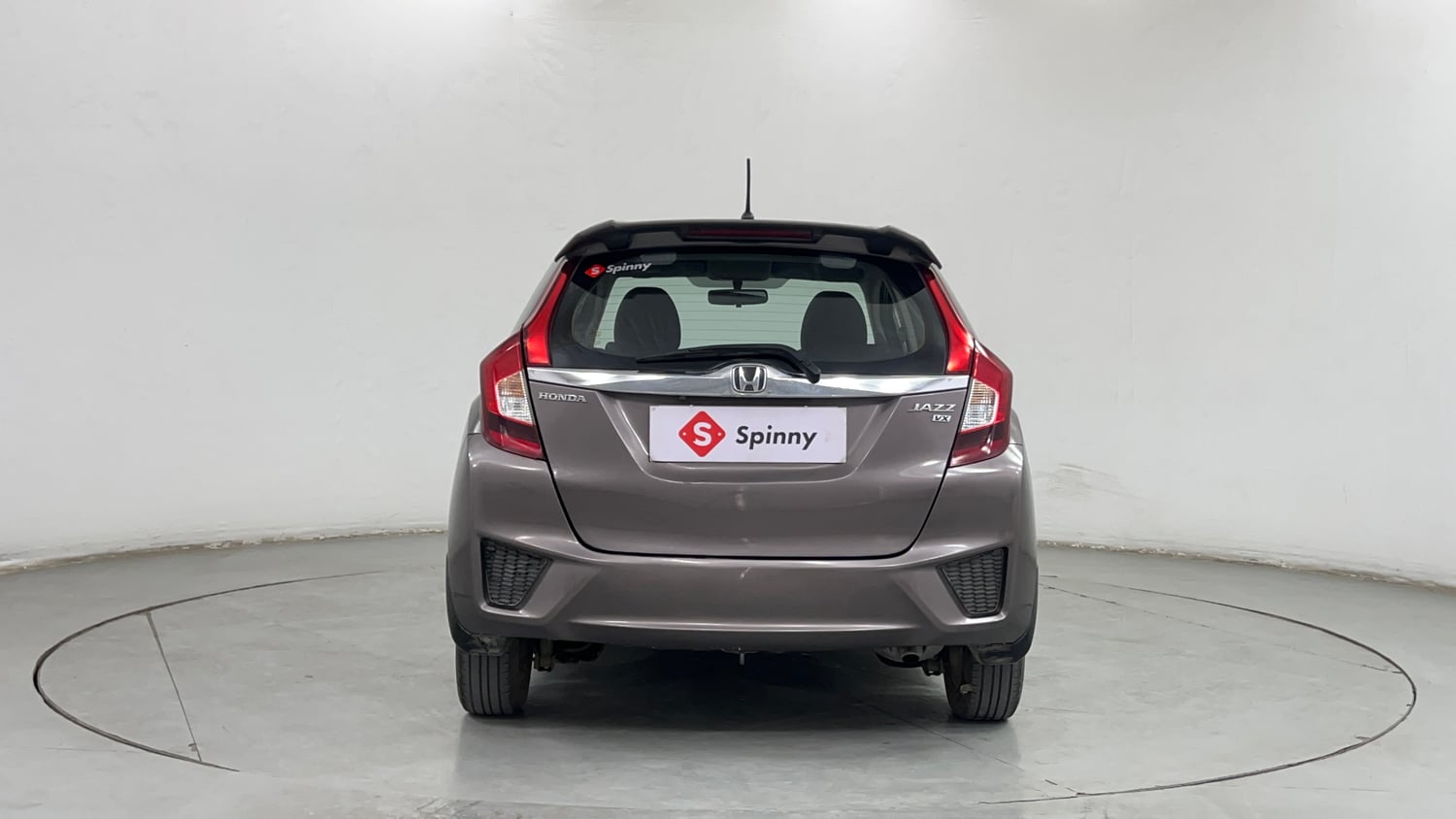 Used 2016 Honda Jazz VX Petrol+cng(outside fitted) Cng Manual exterior BACK VIEW