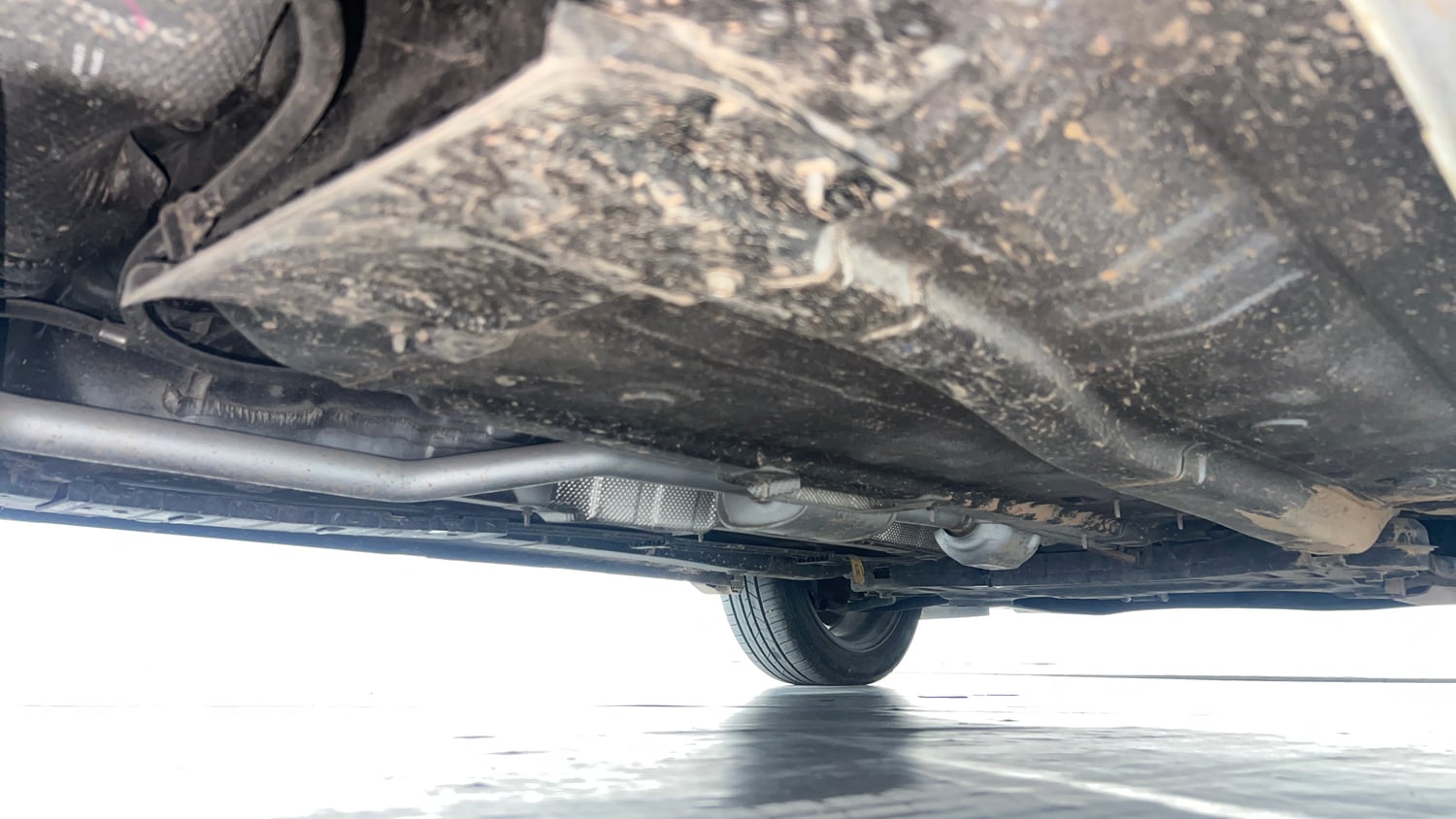 Used 2024 Hyundai New i20 Asta (O) 1.2 IVT Petrol Automatic extra REAR RIGHT UNDERBODY VIEW