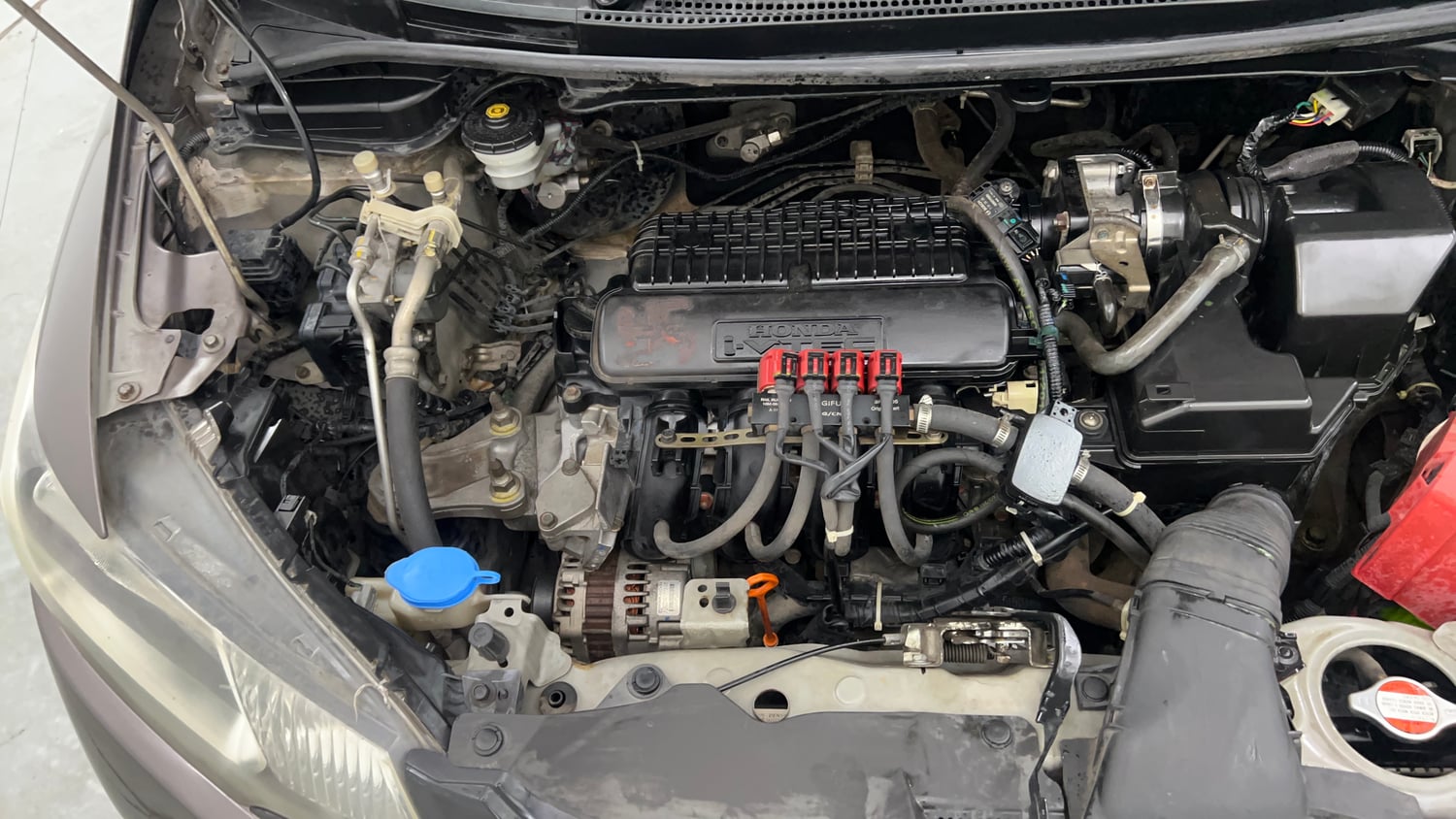 Used 2016 Honda Jazz VX Petrol+cng(outside fitted) Cng Manual engine ENGINE RIGHT SIDE VIEW