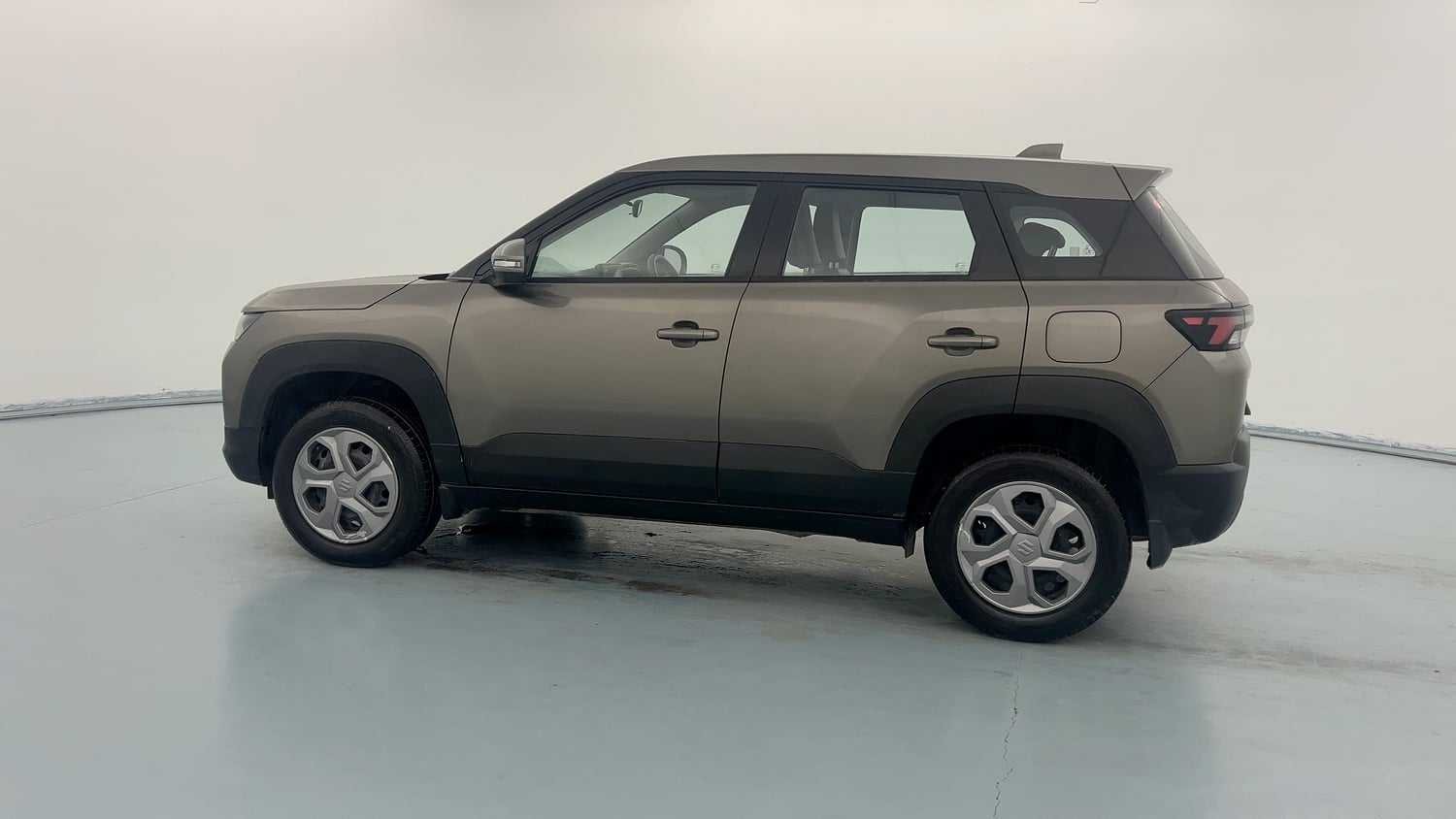 Used 2025 Maruti Suzuki Brezza VXi Petrol Manual exterior LEFT SIDE VIEW
