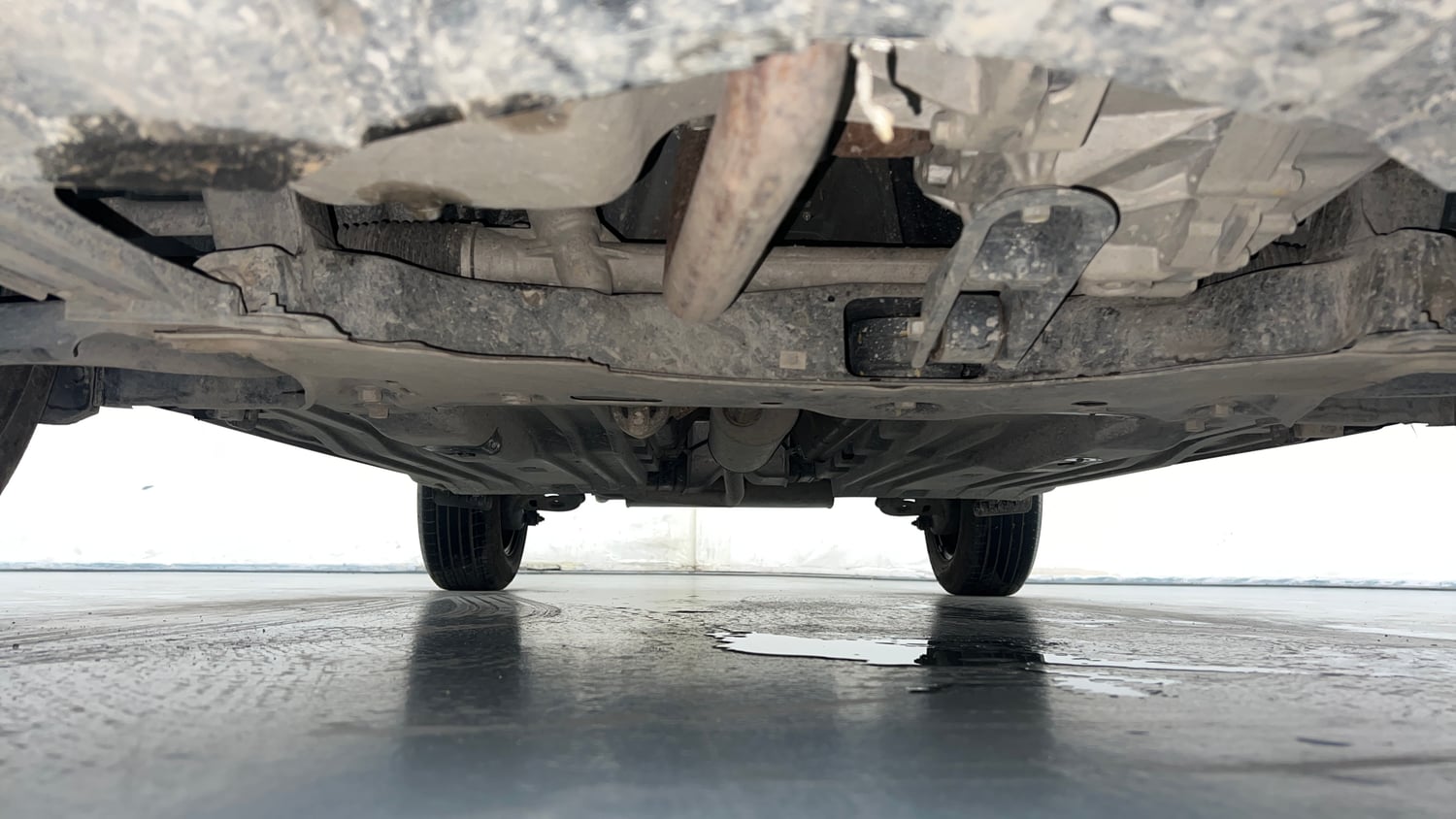 Used 2025 Maruti Suzuki Brezza VXi Petrol Manual extra FRONT LEFT UNDERBODY VIEW