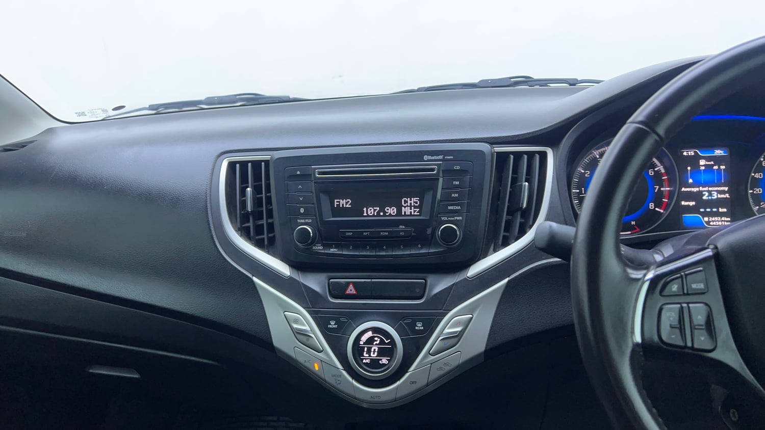 Used 2017 Maruti Suzuki Baleno Zeta 1.2 Petrol Manual interior MUSIC SYSTEM & AC CONTROL VIEW