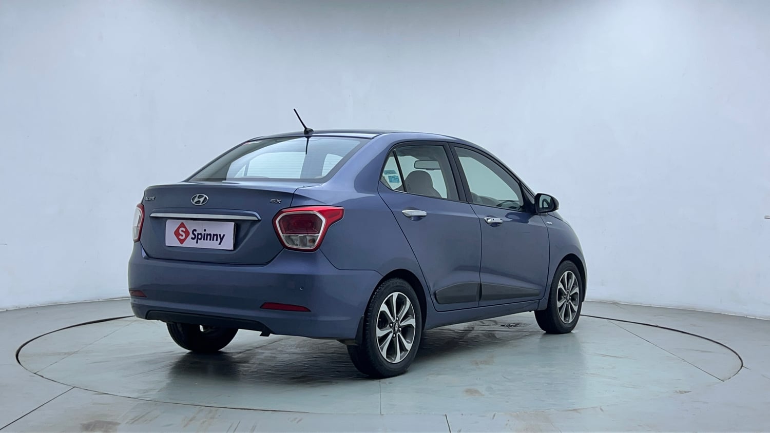 Used 2014 Hyundai Xcent S AT 1.2 (O) Petrol Automatic exterior RIGHT REAR CORNER VIEW