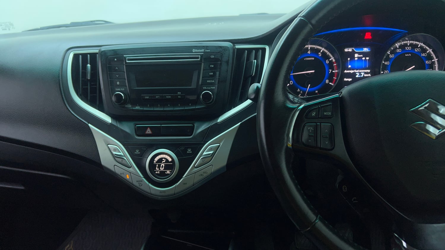 Used 2016 Maruti Suzuki Baleno Zeta 1.2 Petrol Manual top_features Integrated (in-dash) music system
