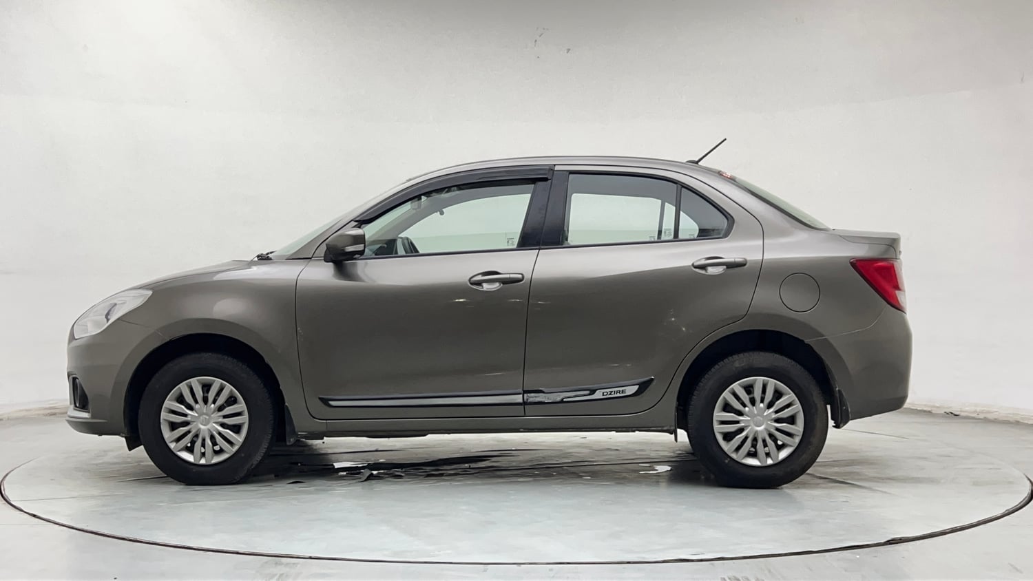 Used 2022 Maruti Suzuki Dzire VXi Petrol Manual exterior LEFT SIDE VIEW