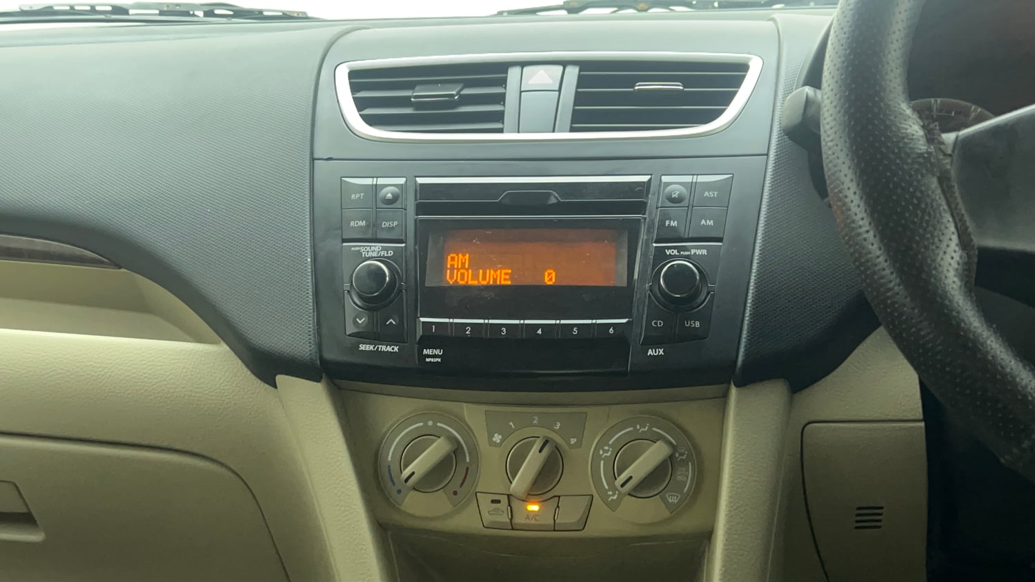 Used 2015 Maruti Suzuki Swift Dzire VXI Petrol Manual top_features Integrated (in-dash) music system