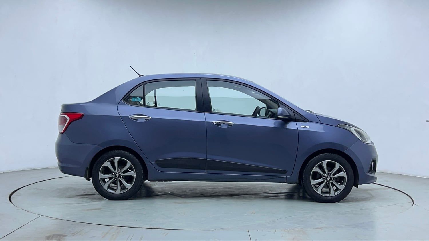 Used 2014 Hyundai Xcent S AT 1.2 (O) Petrol Automatic exterior RIGHT SIDE VIEW