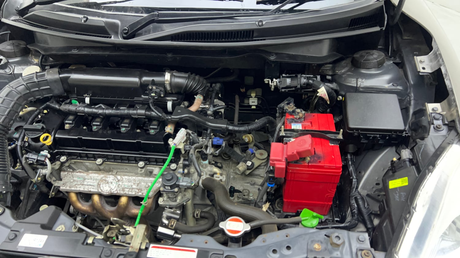 Used 2022 Maruti Suzuki Dzire VXi Petrol Manual engine ENGINE LEFT SIDE VIEW