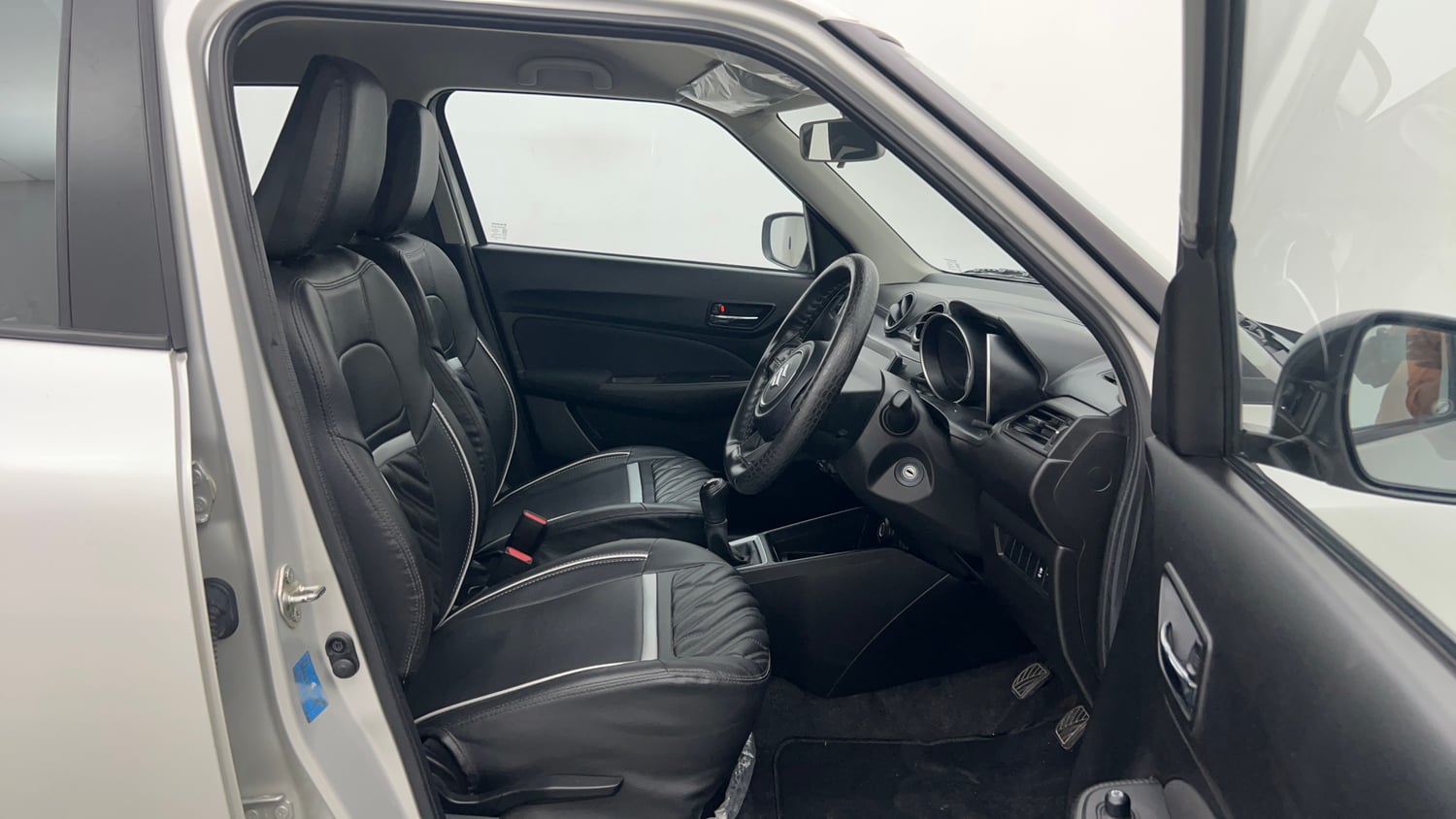 Used 2023 Maruti Suzuki Swift VXi Petrol Manual interior RIGHT SIDE FRONT DOOR CABIN VIEW