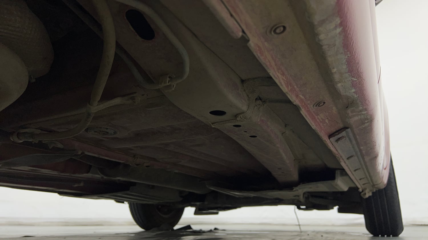 Used 2024 Maruti Suzuki Swift VXi (O) Petrol Manual extra REAR RIGHT UNDERBODY VIEW