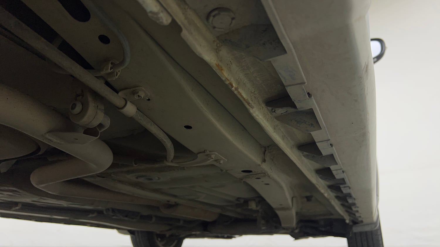 Used 2021 Maruti Suzuki XL6 Zeta MT Petrol Petrol Manual extra REAR RIGHT UNDERBODY VIEW