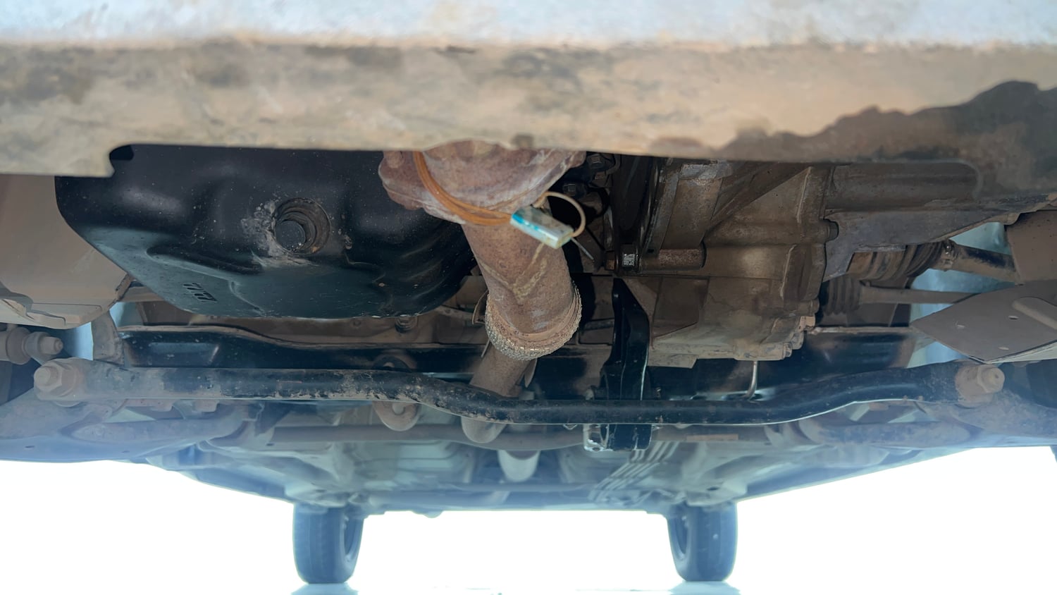Used 2022 Tata Tigor XZ Plus CNG Cng Manual extra FRONT LEFT UNDERBODY VIEW