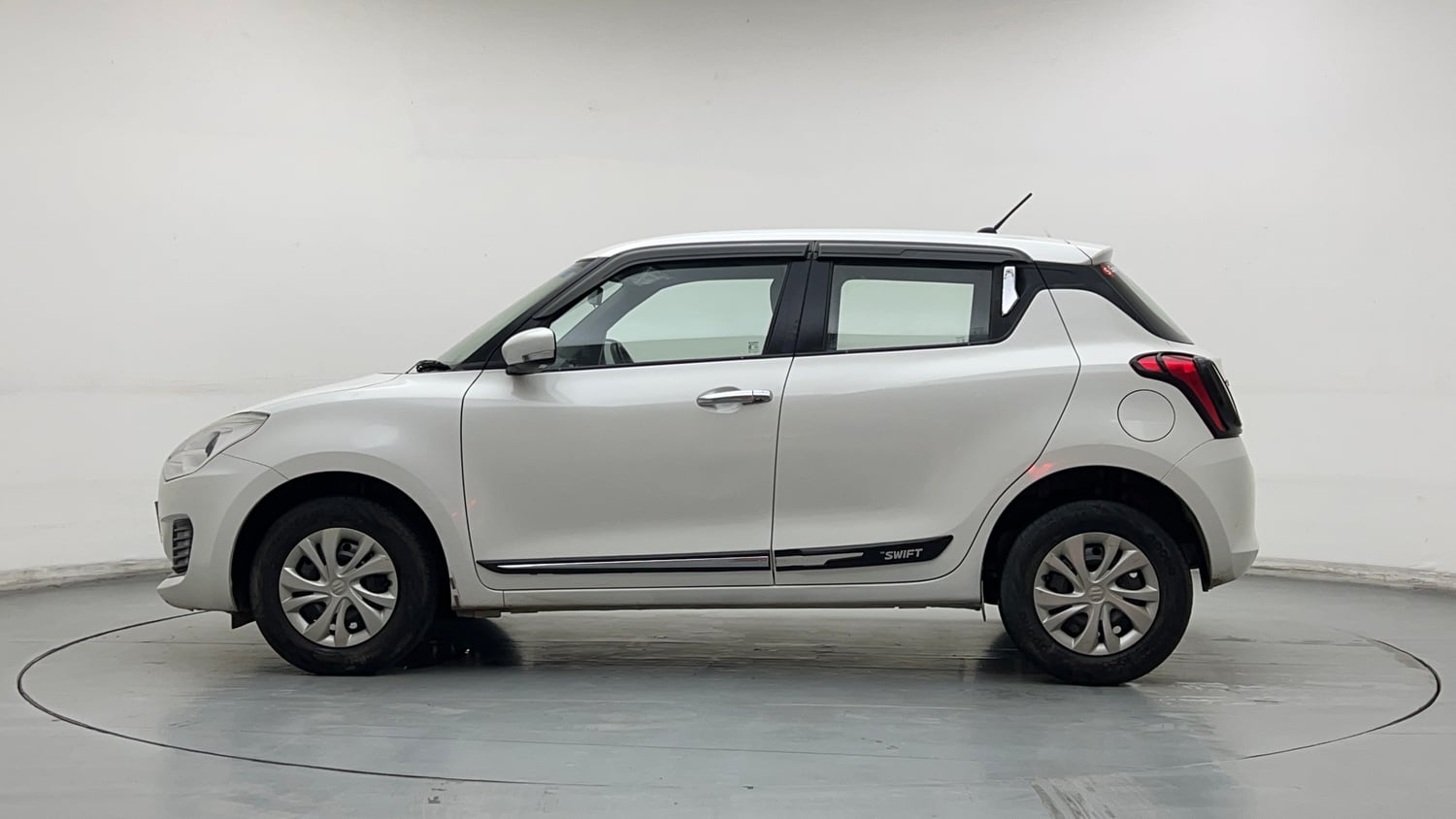 Used 2019 Maruti Suzuki Swift VXi Petrol Manual exterior LEFT SIDE VIEW