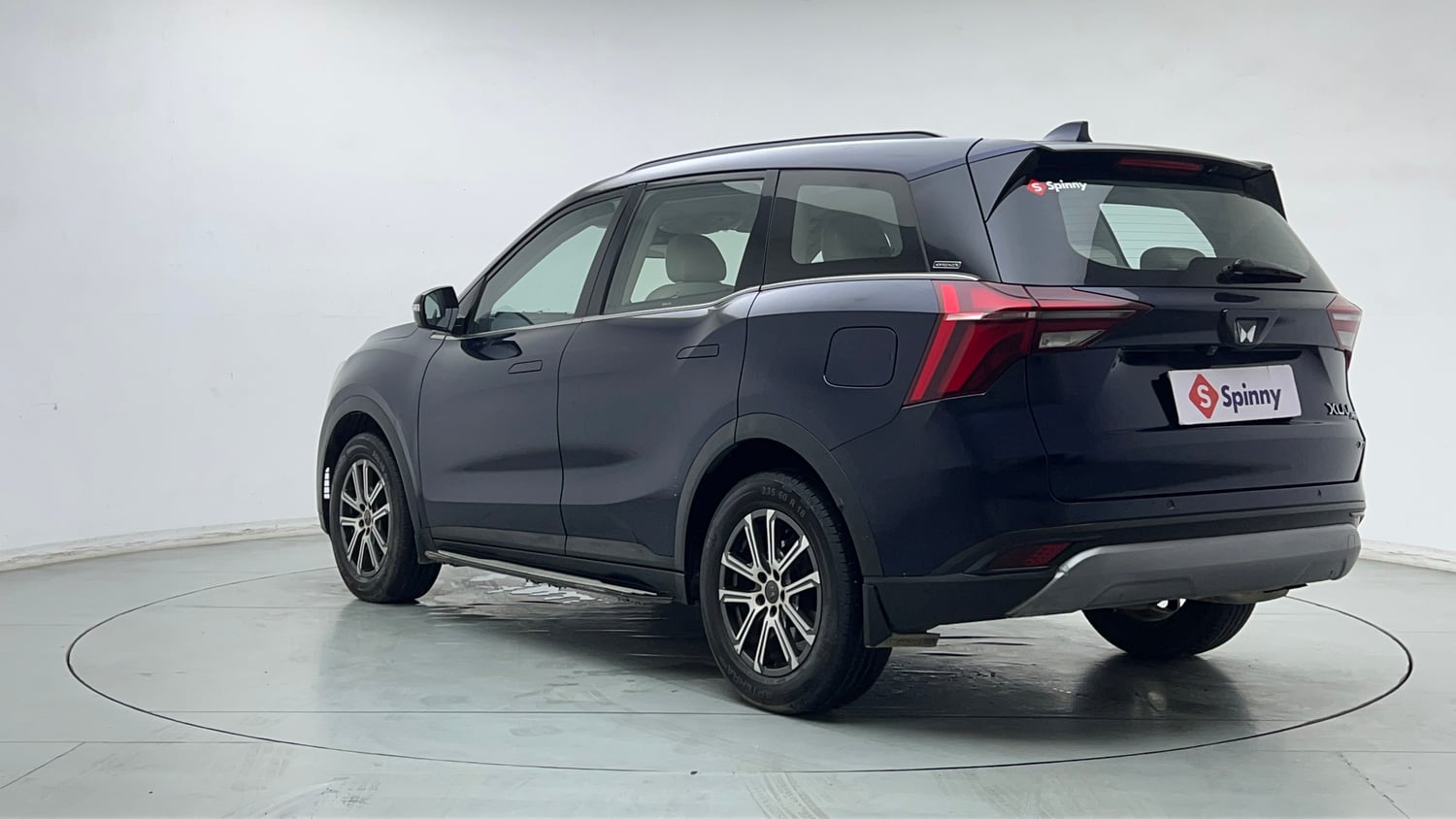 Used 2022 Mahindra XUV700 AX 7 Petrol MT 7 STR Petrol Manual exterior LEFT REAR CORNER VIEW