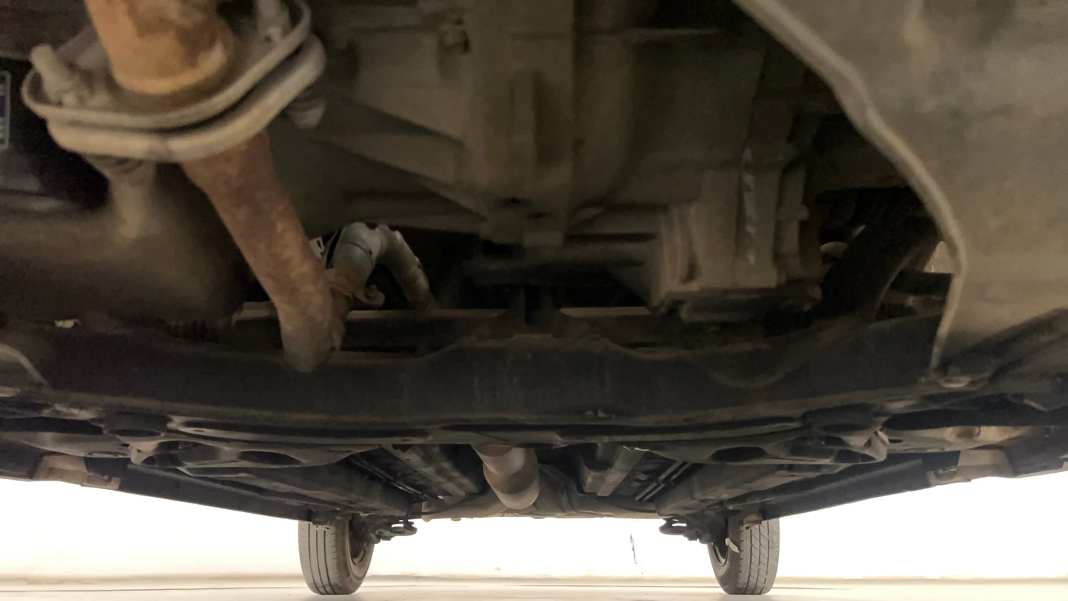 Used 2014 Maruti Suzuki Swift VXi Petrol Manual extra FRONT LEFT UNDERBODY VIEW