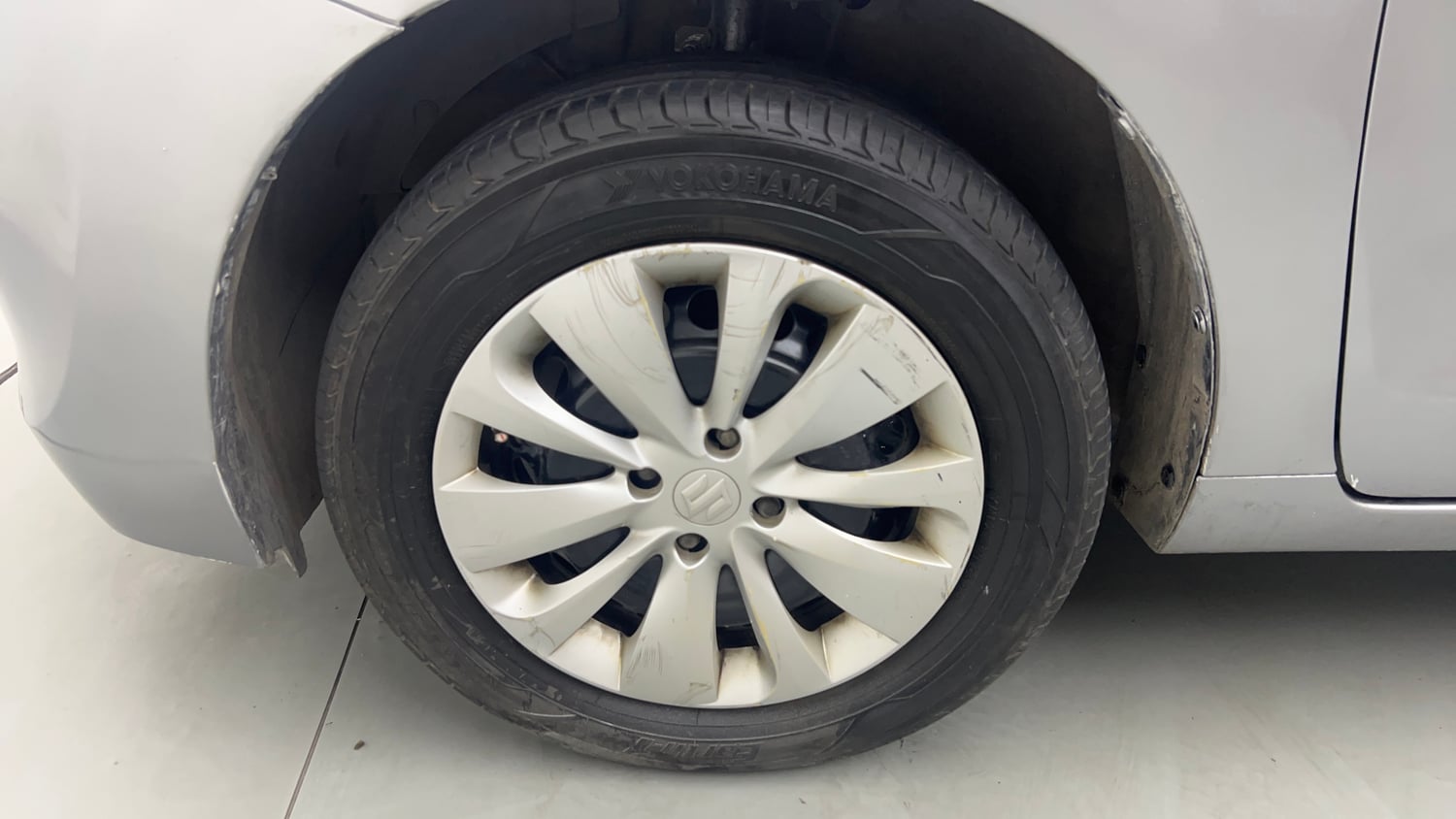 Used 2017 Maruti Suzuki Baleno Delta 1.2 Petrol Manual tyres LEFT FRONT TYRE RIM VIEW