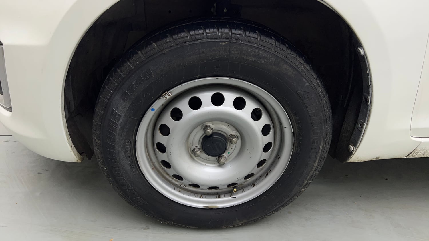 Used 2016 Maruti Suzuki Swift Lxi (O) Petrol Manual tyres LEFT FRONT TYRE RIM VIEW