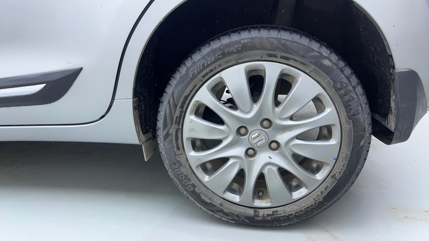 Used 2017 Maruti Suzuki Baleno Zeta 1.3 Diesel Manual tyres LEFT REAR TYRE RIM VIEW