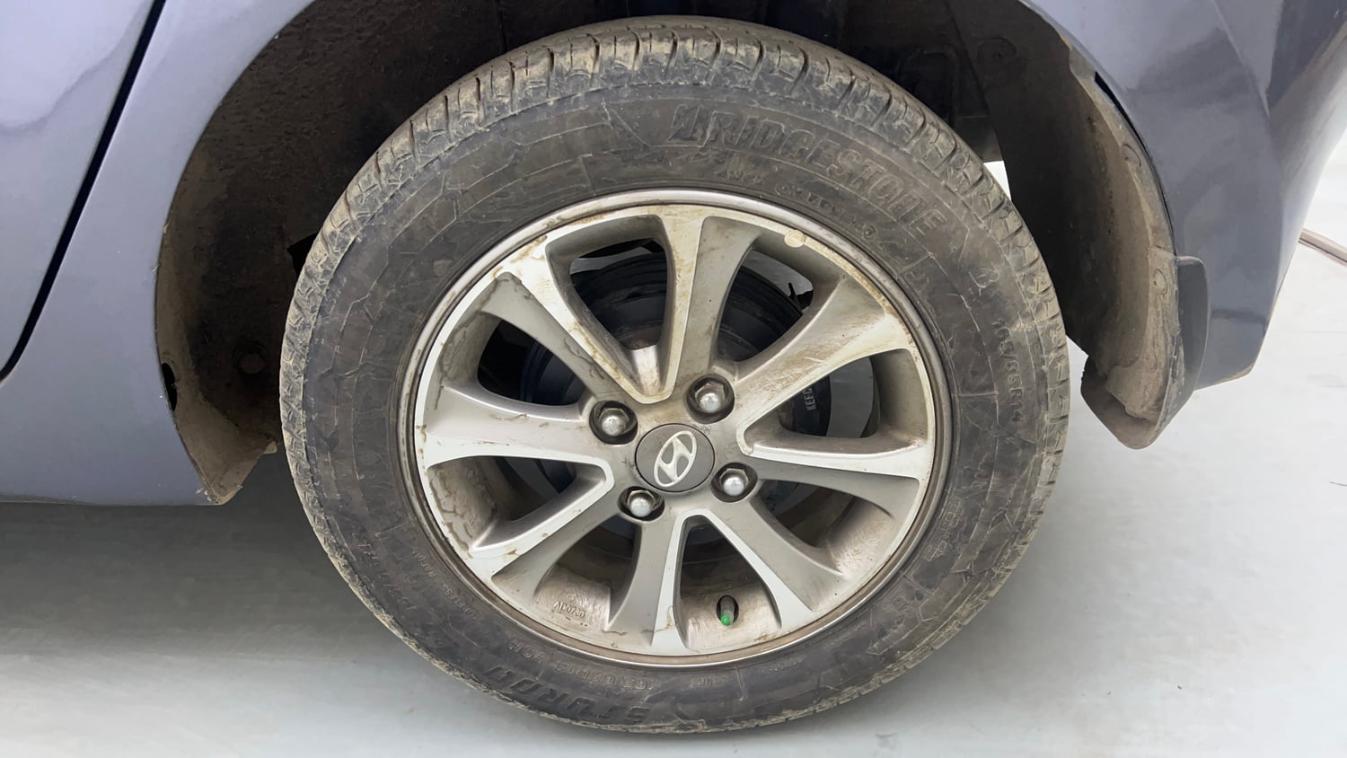 Used 2015 Hyundai Grand i10 Asta 1.2 Kappa VTVT Petrol Manual tyres LEFT REAR TYRE RIM VIEW