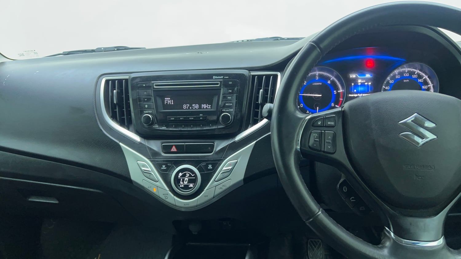 Used 2017 Maruti Suzuki Baleno Zeta 1.3 Diesel Manual top_features Integrated (in-dash) music system