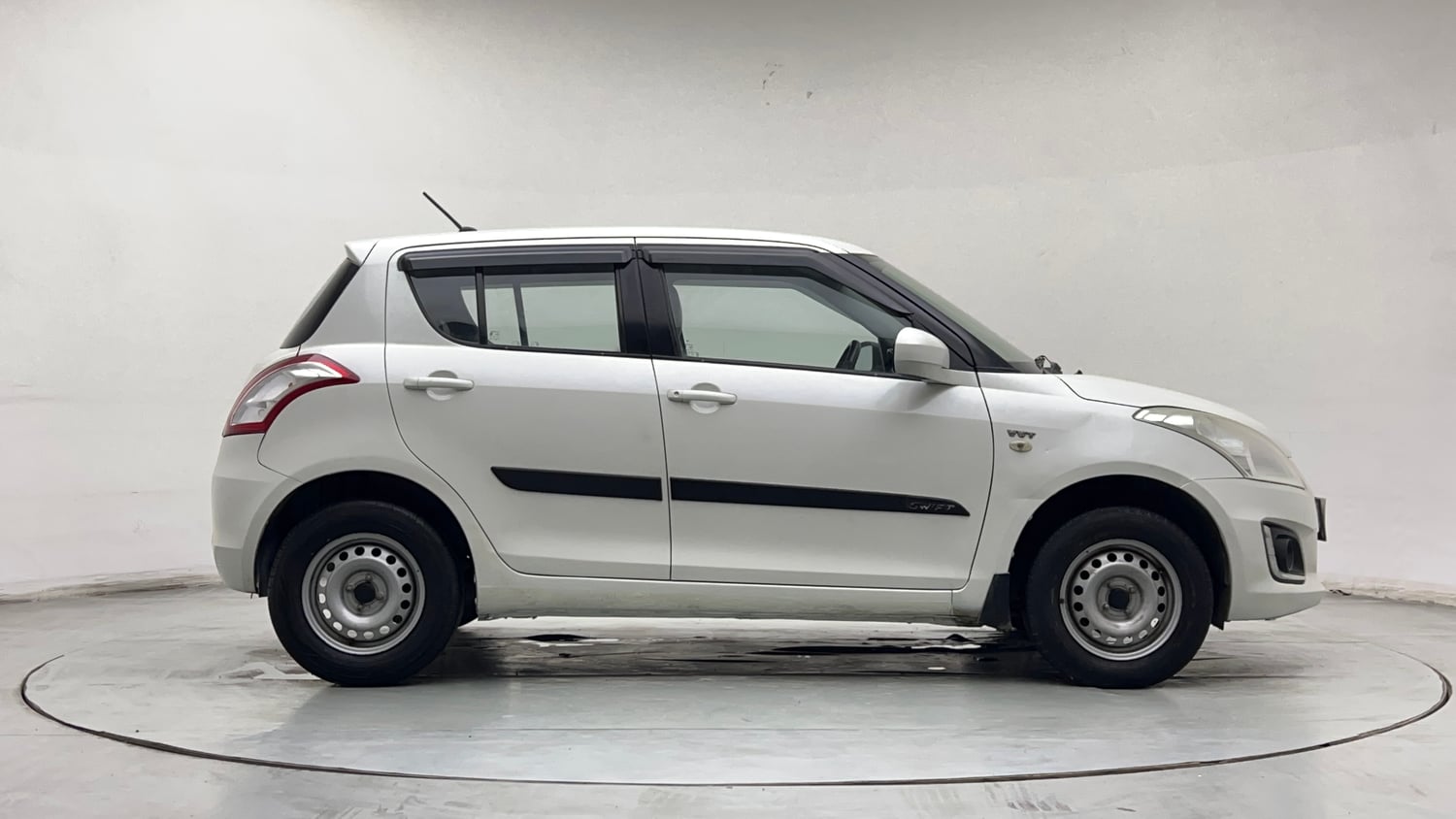 Used 2016 Maruti Suzuki Swift Lxi (O) Petrol Manual exterior RIGHT SIDE VIEW
