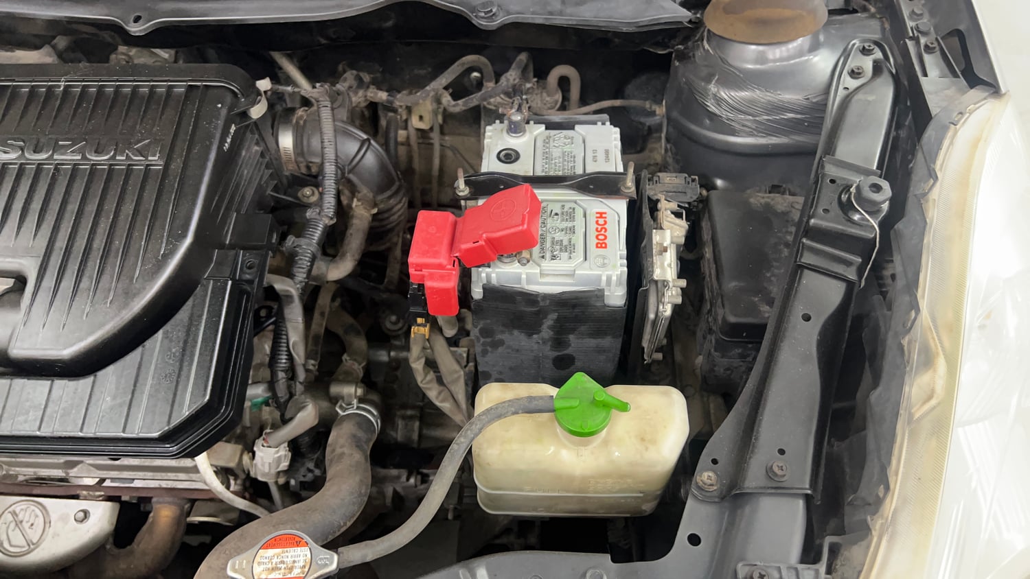 Used 2012 Maruti Suzuki Swift VXi Petrol Manual engine ENGINE LEFT SIDE VIEW