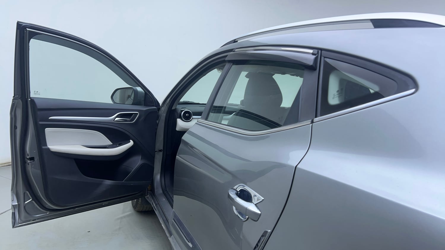 Used 2023 MG Motors Astor Sharp 1.5 CVT Old Generation Petrol Automatic interior LEFT FRONT DOOR OPEN VIEW