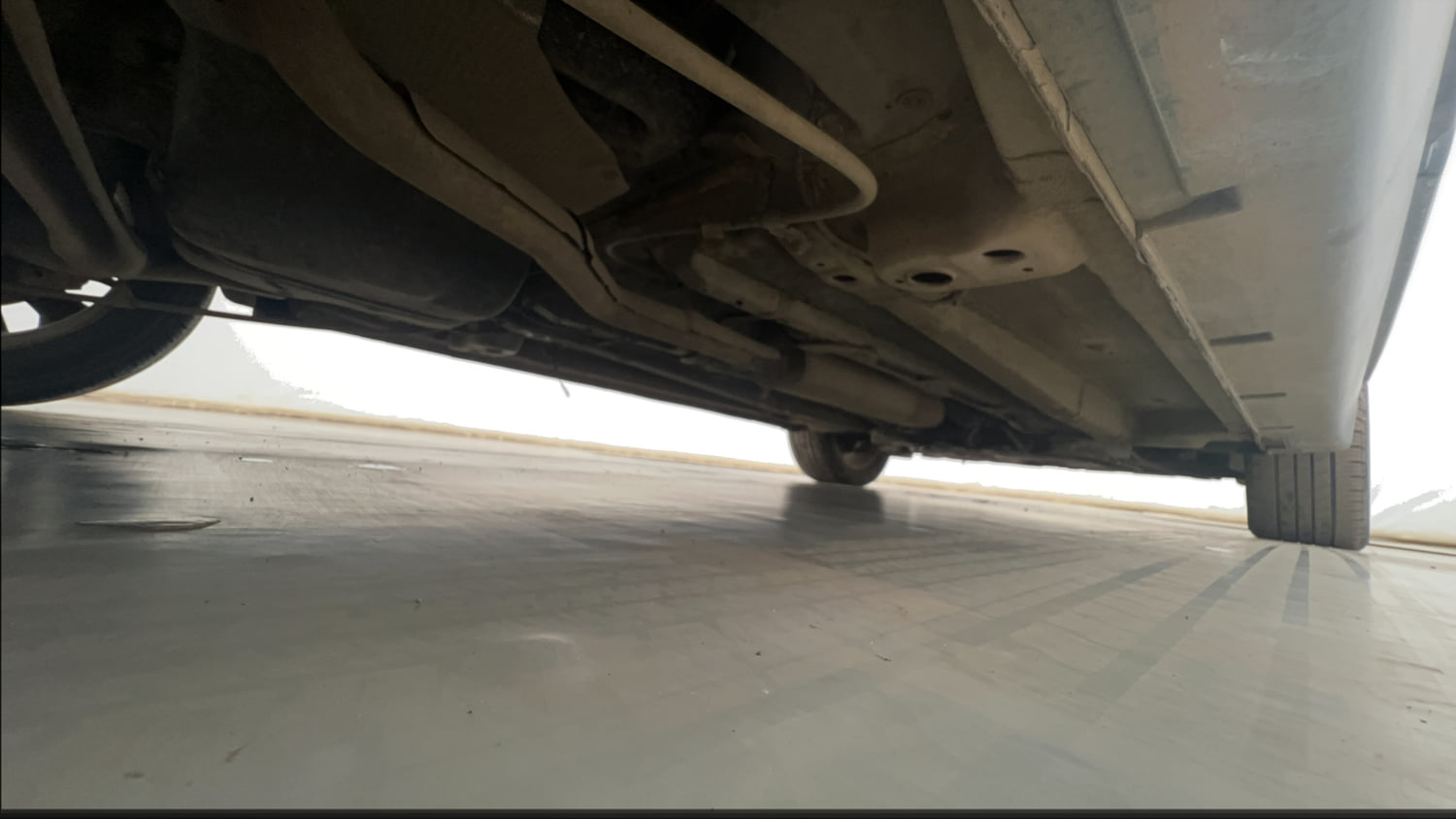 Used 2021 Mahindra XUV 300 W8 (O) 1.2 Petrol Petrol Manual extra REAR RIGHT UNDERBODY VIEW