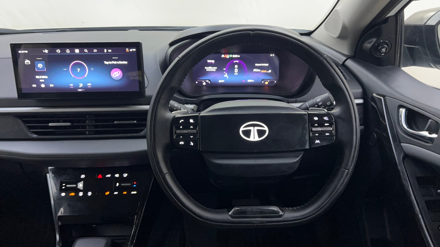 Used 2025 Tata Nexon Fearless Plus (PS) 1.2 Petrol DCA Dual Tone Petrol Automatic interior STEERING VIEW