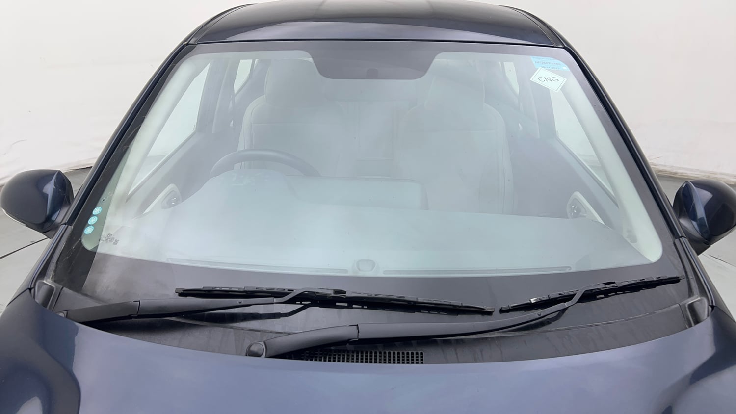 Used 2023 Hyundai Aura SX 1.2 CNG Cng Manual exterior FRONT WINDSHIELD VIEW