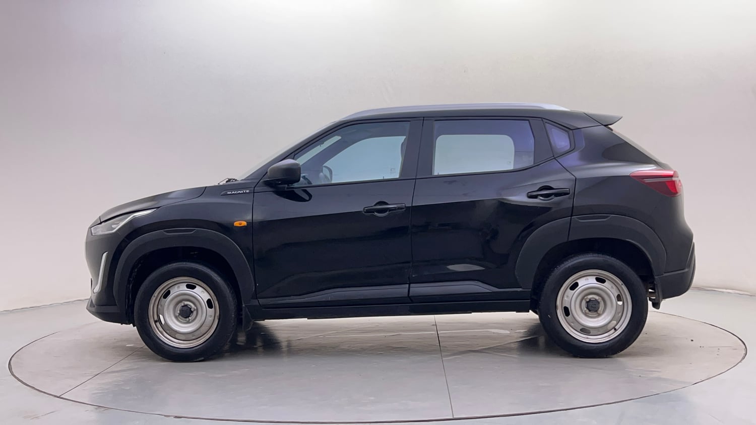 Used 2024 Nissan Magnite XE Petrol Manual exterior LEFT SIDE VIEW