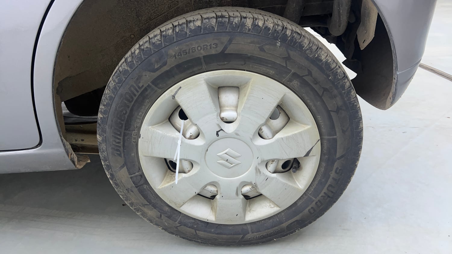 Used 2014 Maruti Suzuki Wagon R LXI Petrol Manual tyres LEFT REAR TYRE RIM VIEW