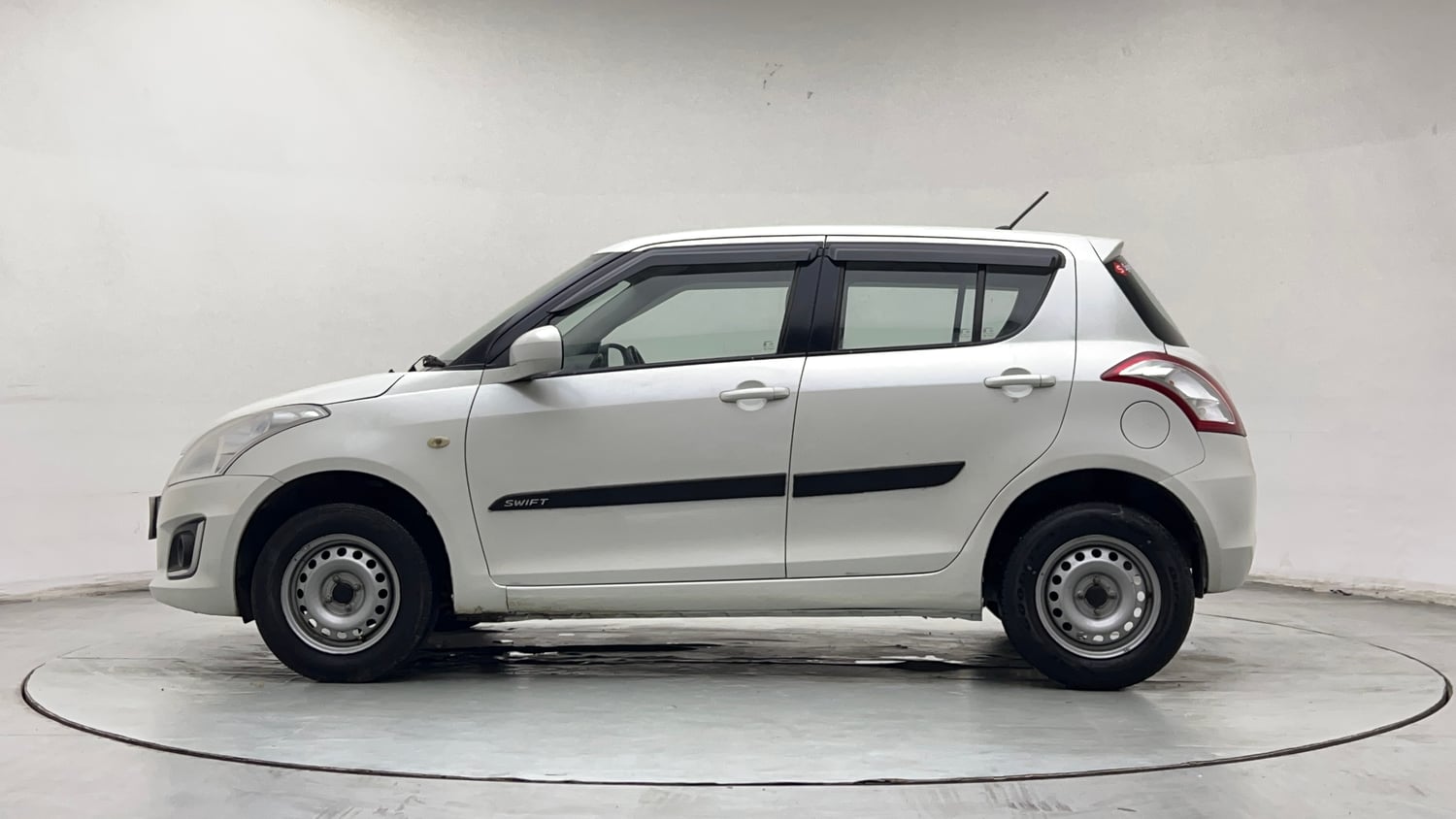 Used 2016 Maruti Suzuki Swift Lxi (O) Petrol Manual exterior LEFT SIDE VIEW