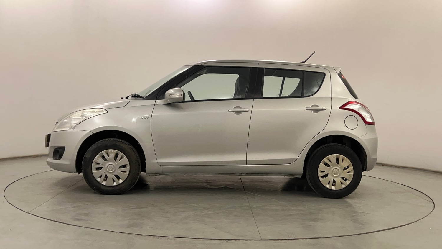 Used 2014 Maruti Suzuki Swift VXi Petrol Manual exterior LEFT SIDE VIEW