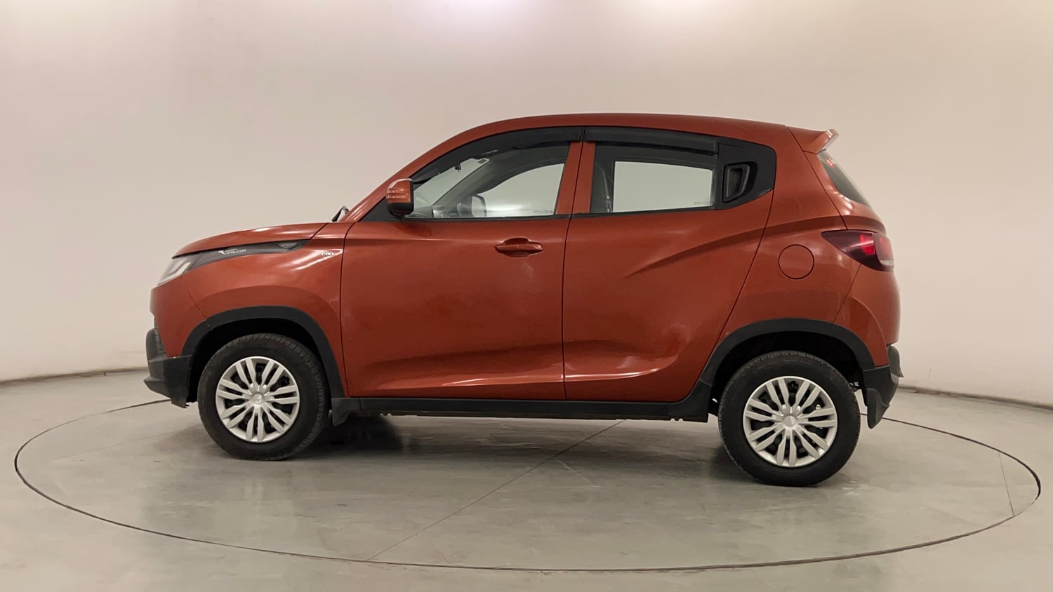 Used 2016 Mahindra KUV100 K4 5 STR Petrol Manual exterior LEFT SIDE VIEW