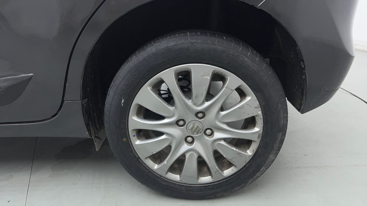 Used 2018 Maruti Suzuki Baleno Zeta 1.2 Petrol Manual tyres LEFT REAR TYRE RIM VIEW