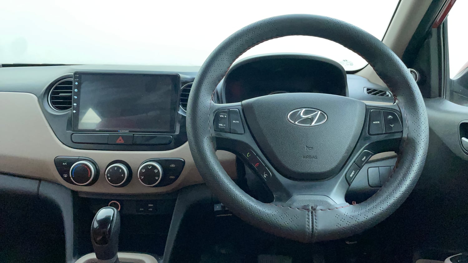 Used 2018 Hyundai Grand i10 Sportz AT 1.2 Kappa VTVT Petrol Automatic interior STEERING VIEW